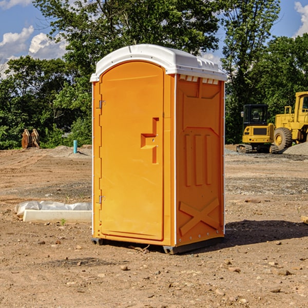 how often are the portable restrooms cleaned and serviced during a rental period in Scotts Corners